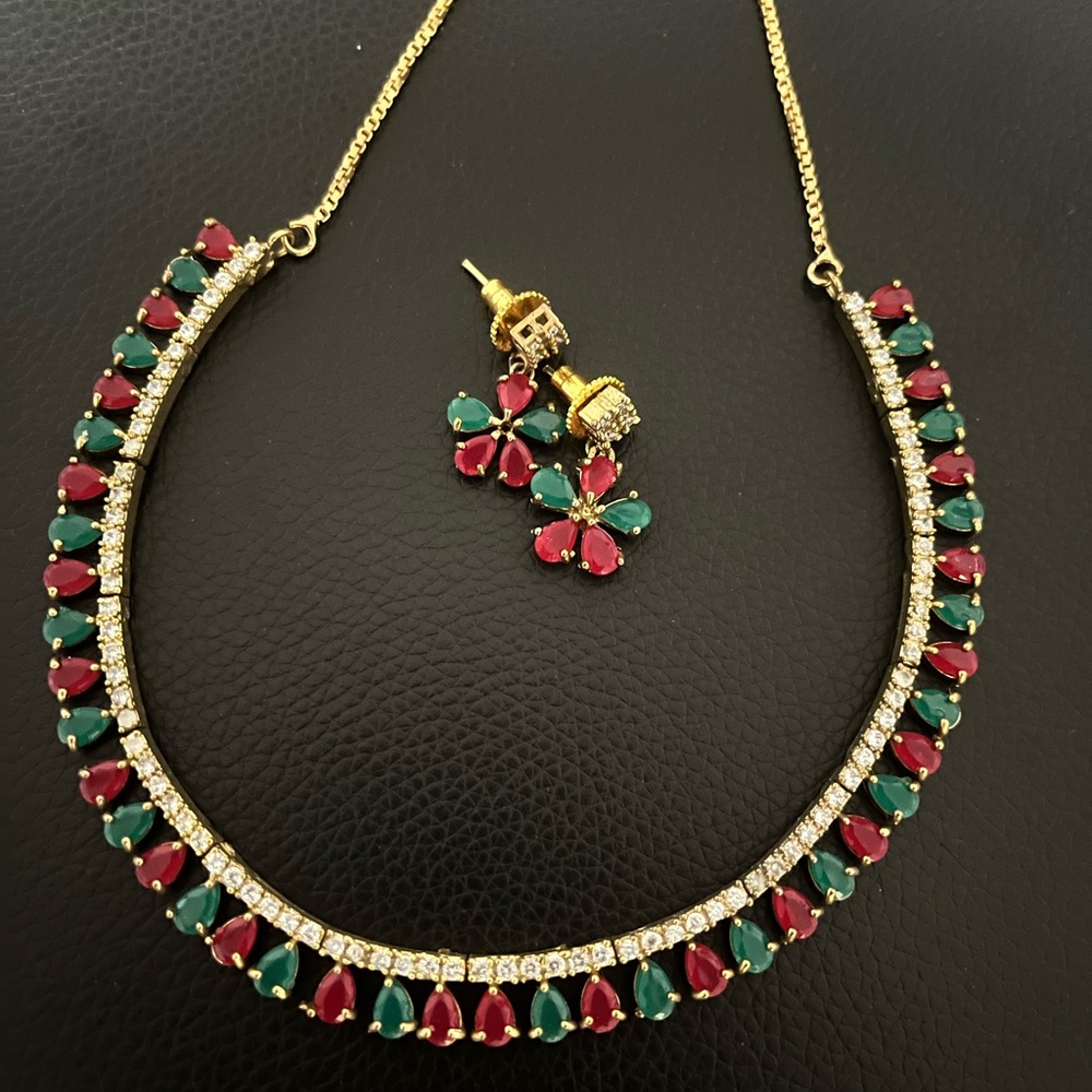 Elegant Gold Necklace and Earring Set with Red and Green Accents